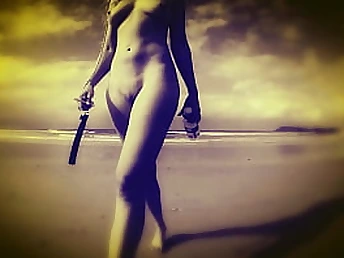 Check out Missy Jubilee, the young platinum-blonde COUGAR, on the beach with her hefty knockers and trimmed muff!