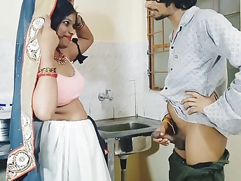 Desi Aunty gets romantic in dramatize expunge kitchenette with a stepson's hard cock